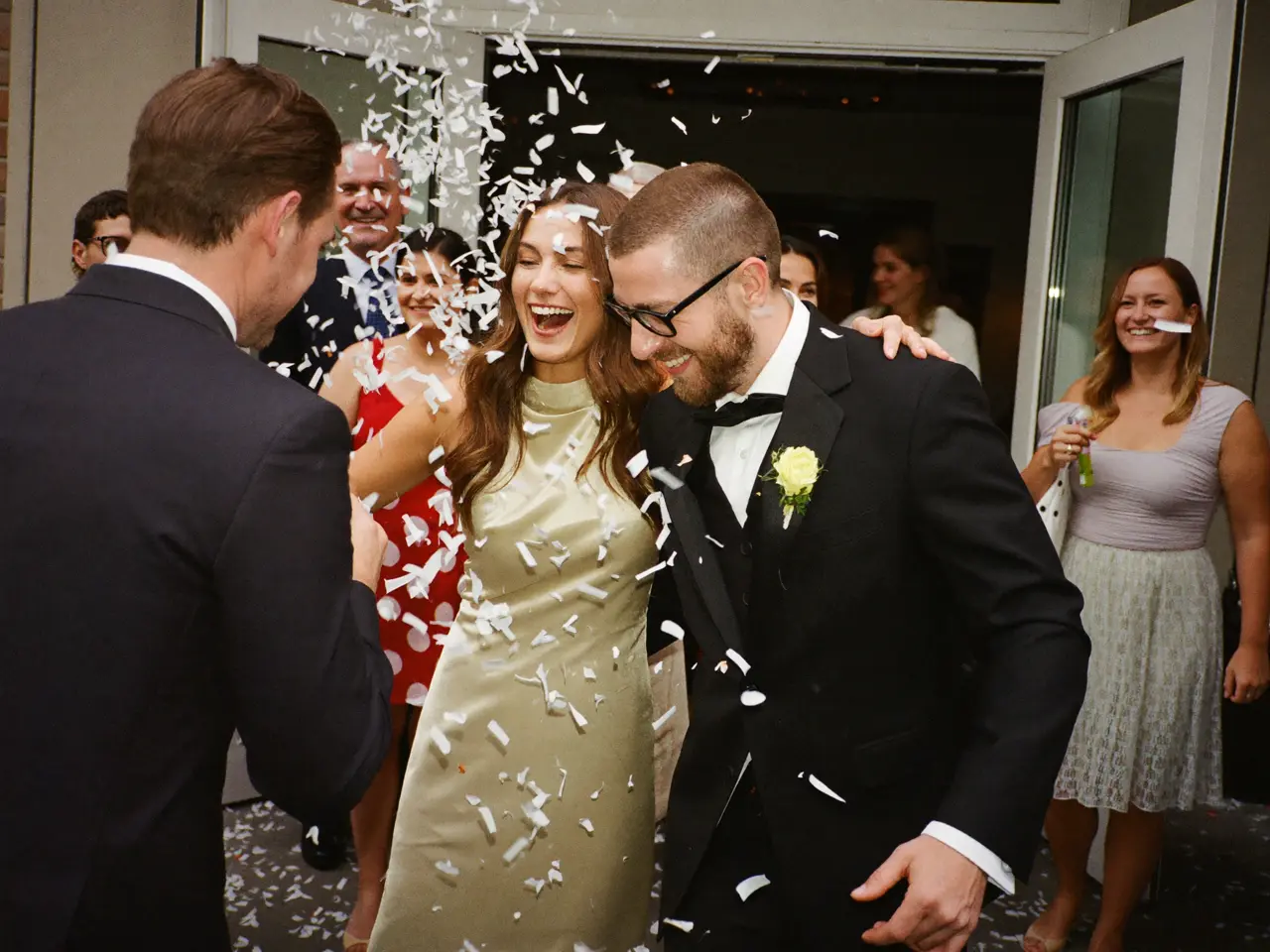 Wedding guests in the United States contributing phone pictures to one shared digital album
